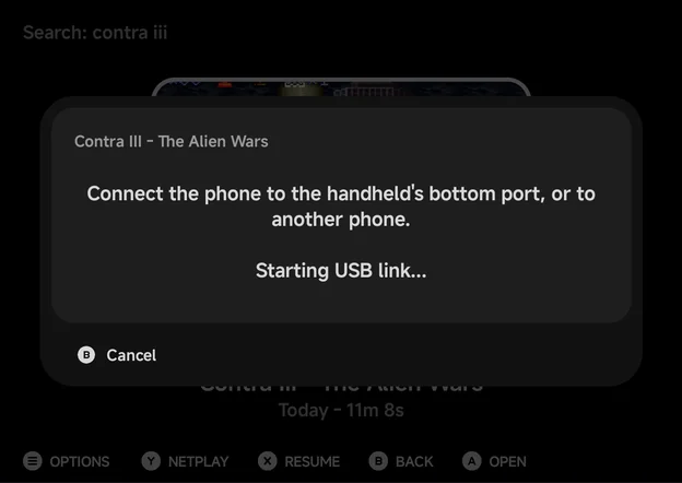 Hosting over USB Cable: “Connect the phone to the handheld's bottom port, or to another phone.” and “Starting USB link...”